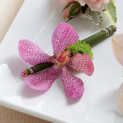 Pink Mokara Boutonniere –  Brown Pleasance Florists Inc, Lakewood OH